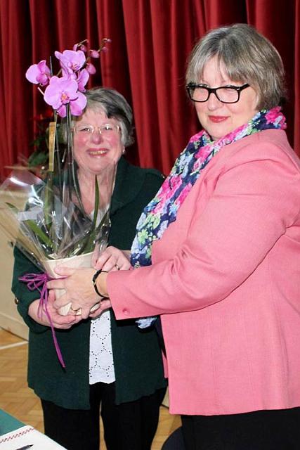 Linda Needle presents a parting gift to our outgoing president Julie Hillier.jpg